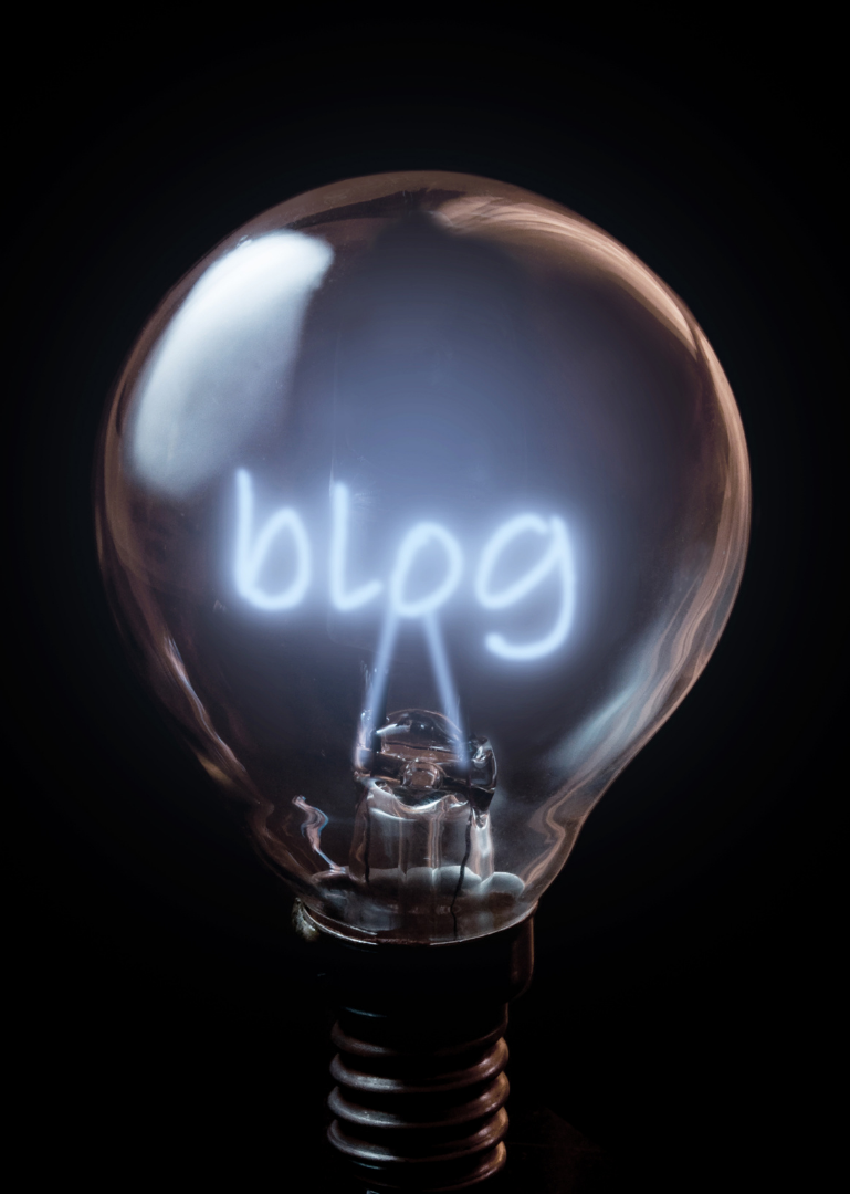 Lightbulb with the word "blog" inside it, symbolizing a new idea for blogging